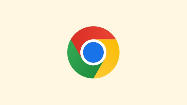 Округли Chrome логотип на жутој позадини.